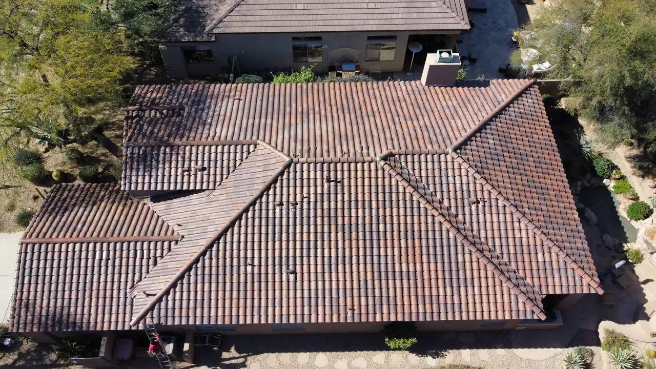 Top-down drone photograph of a completed concrete tile roof by A1 Roofing Solutions